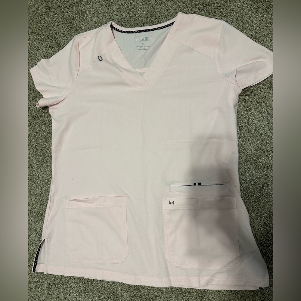 BRAND NEW Koi scrub top. Light pink color